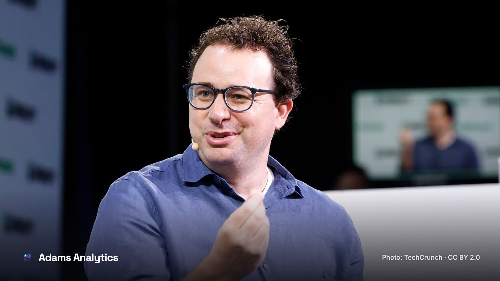 Dario Amodei speaking on stage at TechCrunch Disrupt in San Francisco, 2023