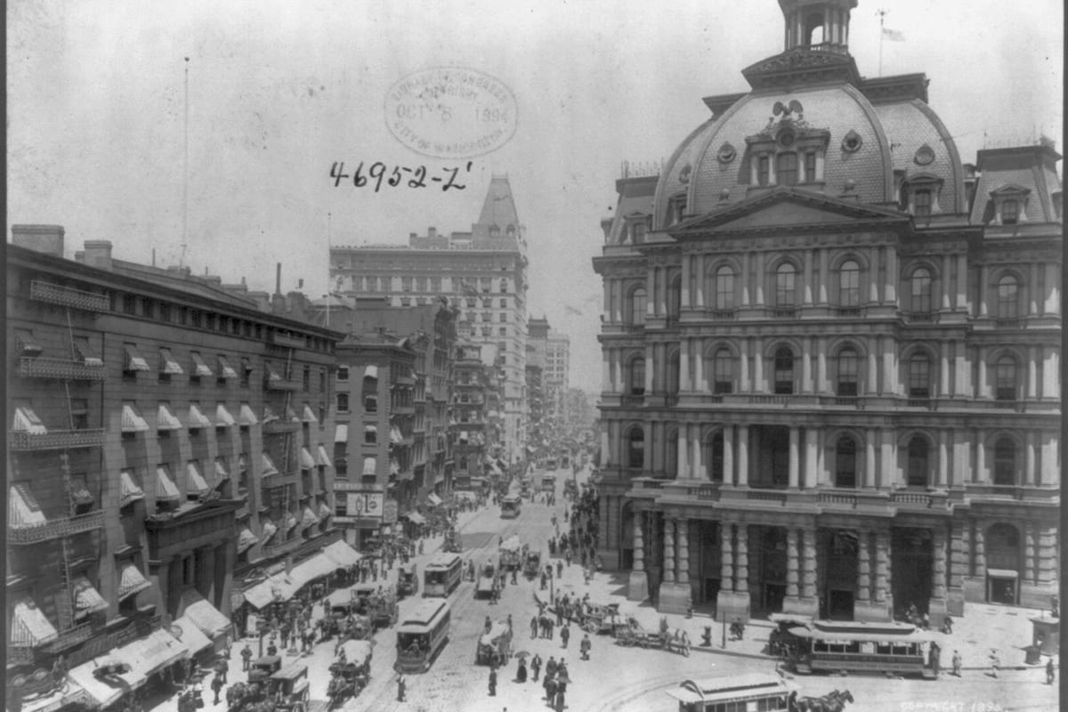 Broadway in New York in 1894 with horse-drawn streetcars and carriages